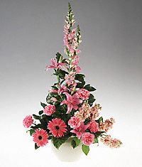 Vase arrangement of pink and peach flowers sympathy