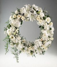 Wreath of mixed white flowers.