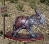 Handcarved Wooden Rocking Elephant Figurine