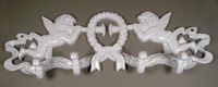 Twin Cherub & Wreath Cast Iron Coat Rack
