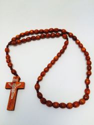 Natural Carved Oval Bead on Stretch Cord Rosary" itemprop="image