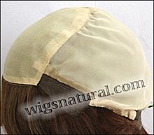 Kylie Envyhair wig, Mono top hand-tied sides and back, color cinnamon raisin