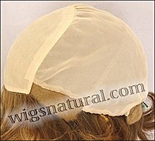 Kylie Envyhair wig, Mono top hand-tied sides and back, color shown light brown