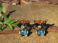 Wisdom of the Ages rose gold Owl Earrings
