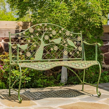 Iron Garden Bench with Blooming Tree - Click to enlarge