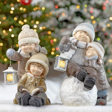 Christmas Figurines Playing in Snow & Holding Lanterns (Set of 2) - Click to enlarge