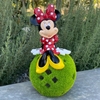 Minnie Mouse Sitting on Garden Ball