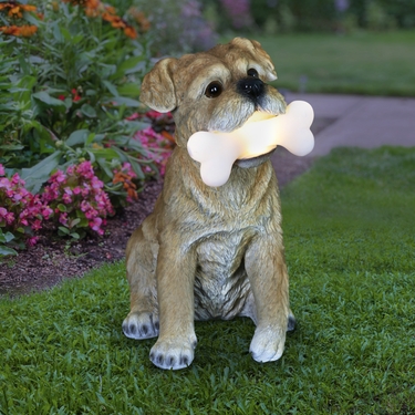 Solar Terrier Dog Holding Bone Toy - Click to enlarge