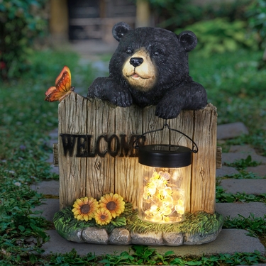 Solar Welcome Bear Holding Jar of Bees - Click to enlarge