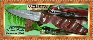 Mcusta Cutlery MC14D Damascus Hunter Knife Cocobolo Wood Handle comes with an Integral Pocket Clip