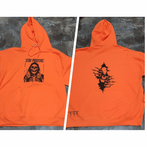 8 ounce Orange fleece sweatshirt with Stay Positive front and skeleton out the wall back