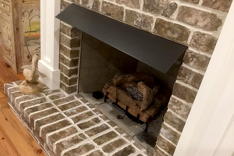 How Fireplace Hoods Protect Your Hearth From Heat Damage!