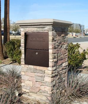 Small Package Locking Column Mailbox in Stone Column