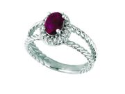 Emerald & diamond oval ring