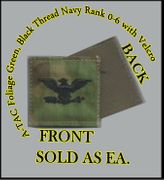 ATACS FOLIAGE GREEN USN RANK CAPT (06) in black thread with Velcro(r) backing