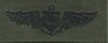 49 Aviator (pilot) Breast Device, on Olive green fabric 49 Aviator (pilot) Breast Device, on Olive green fabric