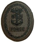 65 E-9 force Command Master Chief Breast Device, on Olive green fabric