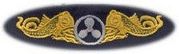 48 Submarine Engineering Breast Device, on Olive green fabric
