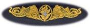 47 Submarine Medical Breast Device, on Olive green fabric