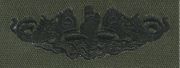 42 Submarine Officer Breast Device, on Olive green fabric