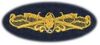 28 Surface Warfare Dental Breast Device, on Olive green fabric 28 Surface Warfare Dental Breast Device, on Olive green fabric