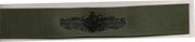 25 Surface Warfare Supply Officer, Breast Device, on Olive green fabric