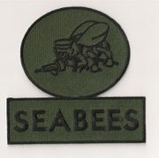 seabee pocket  patch OD Green oval (gun Left)